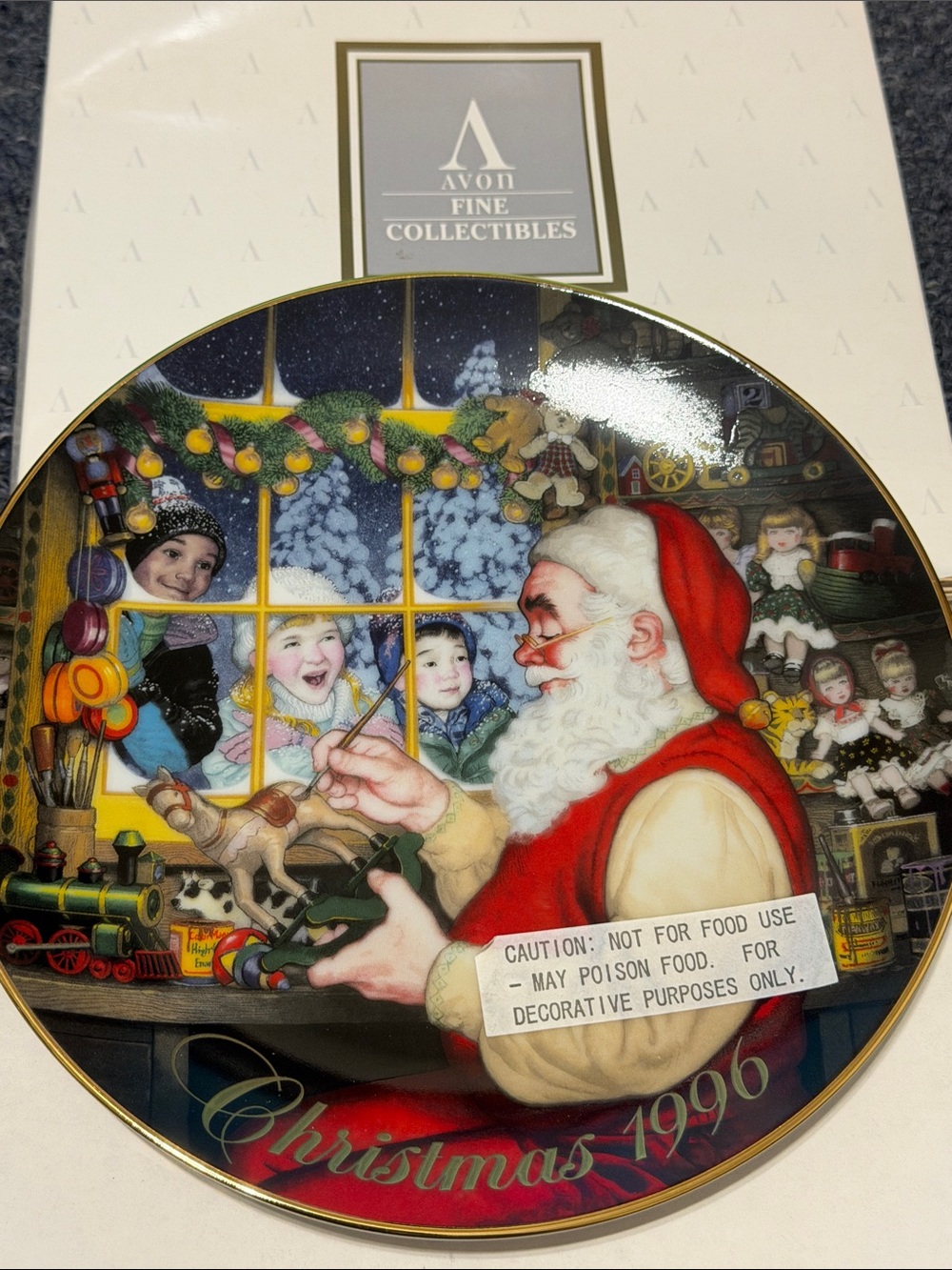 1996 Avon Santa in Workshop Decorative Plate 22k gold trim.